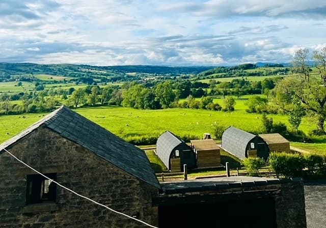 Glamping pods overlooking the countryside at Greendale