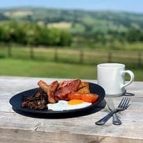 Breakfast with a countryside view at Greendale Tea House